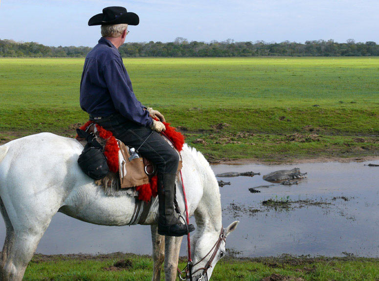 Christian Tassin observing caymans